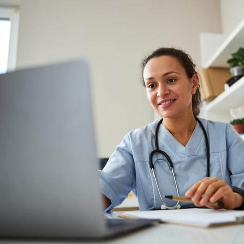 A doctor getting benefits from a remote assistant.